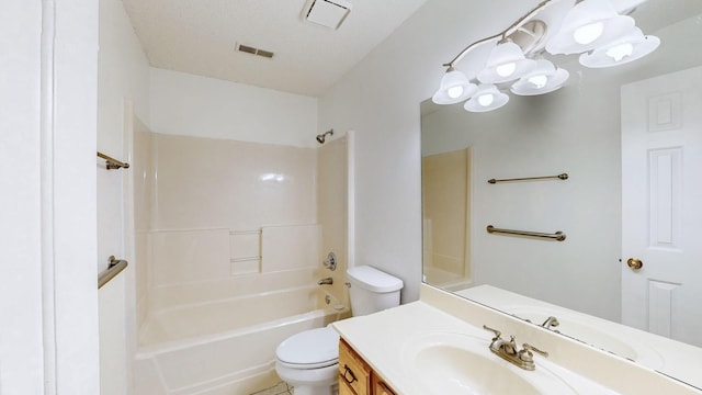 full bathroom featuring toilet, bathtub / shower combination, tile patterned floors, a textured ceiling, and vanity