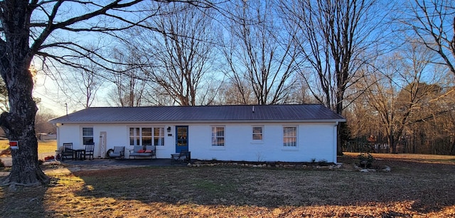 view of front of house featuring a patio area