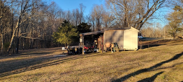 view of outdoor structure with a lawn