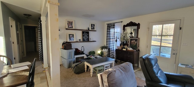 living room featuring light colored carpet