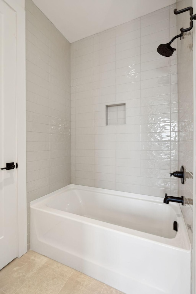 bathroom featuring shower / bathtub combination and tile patterned floors