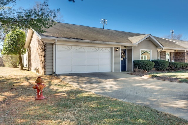 single story home with a garage