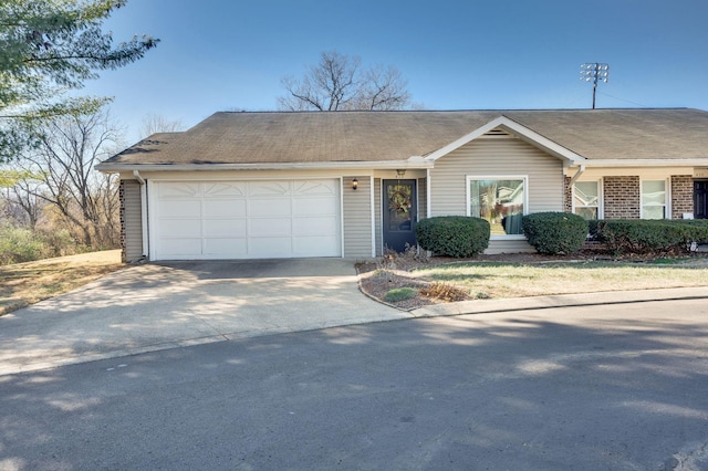 single story home featuring a garage