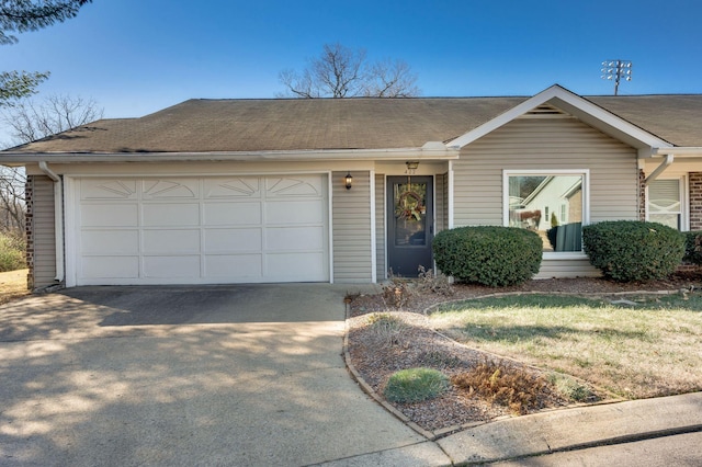 single story home with a garage