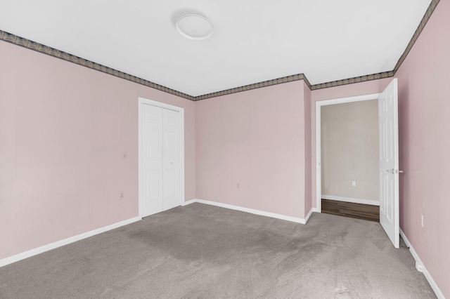 empty room with carpet flooring