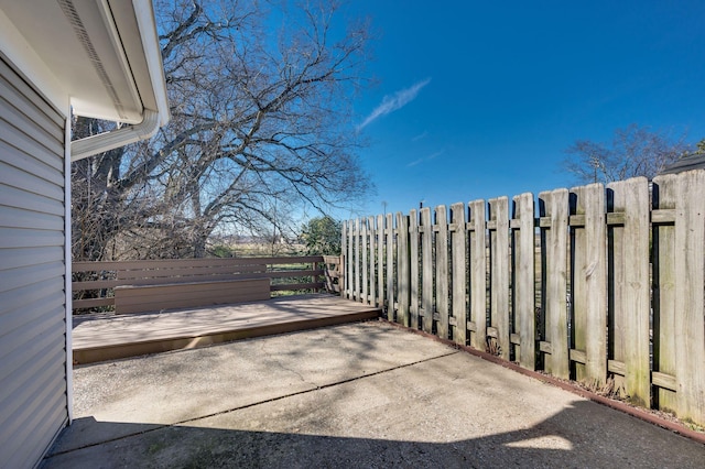 view of patio with a wooden deck