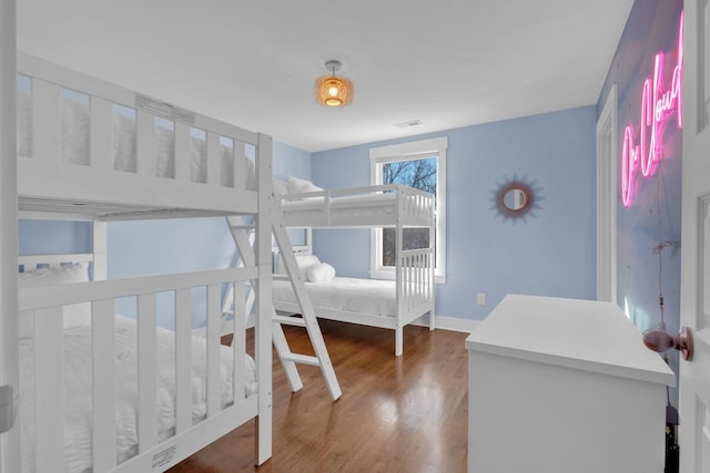 bedroom featuring hardwood / wood-style flooring