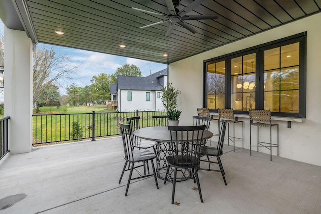 view of patio featuring ceiling fan