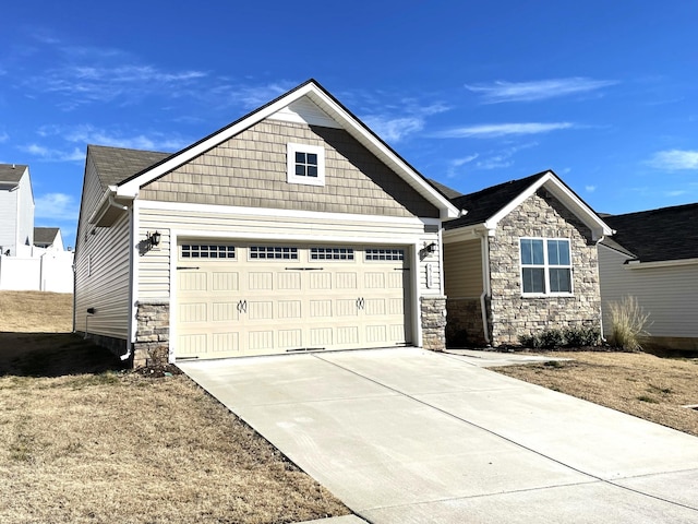 craftsman-style house featuring a garage