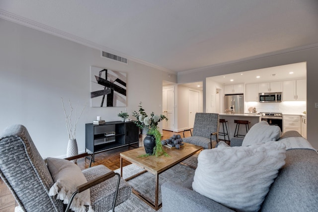 living room featuring light parquet flooring and crown molding