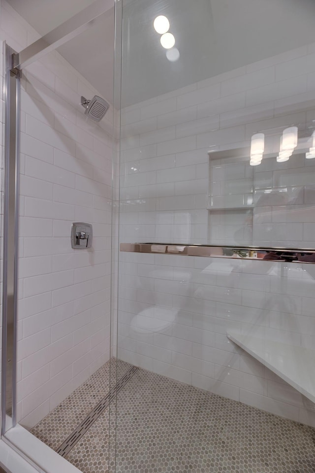 bathroom featuring an enclosed shower