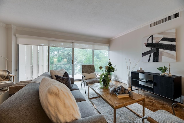 living room with a textured ceiling, ornamental molding, and dark parquet floors