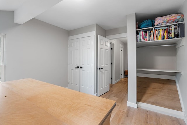 bedroom with light hardwood / wood-style floors