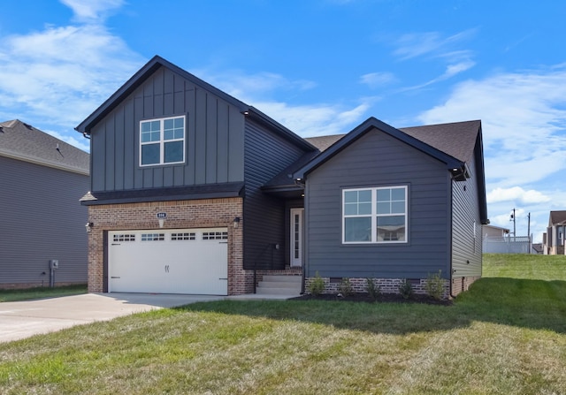 view of front of property featuring a front lawn and a garage