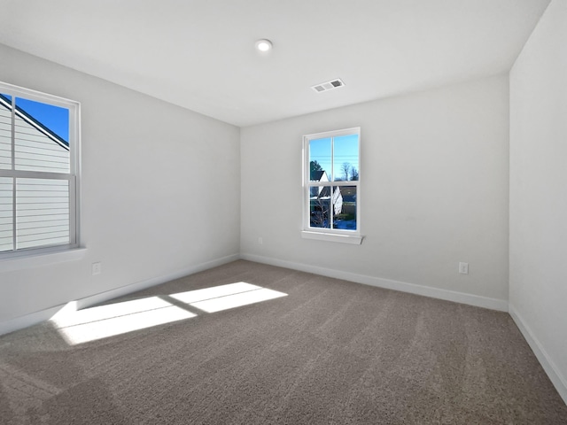 view of carpeted spare room