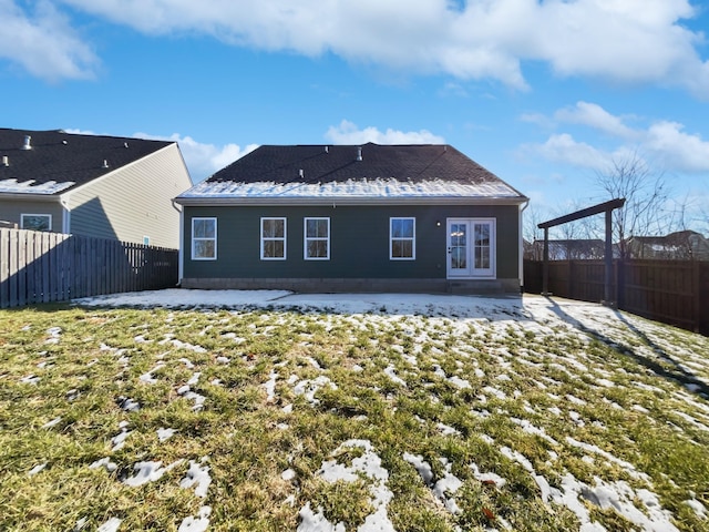 back of house with a patio and a yard