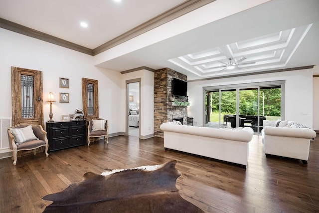 living room featuring ceiling fan, dark hardwood / wood-style floors, ornamental molding, and coffered ceiling