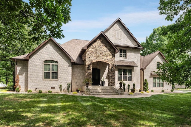 french country inspired facade with a front yard