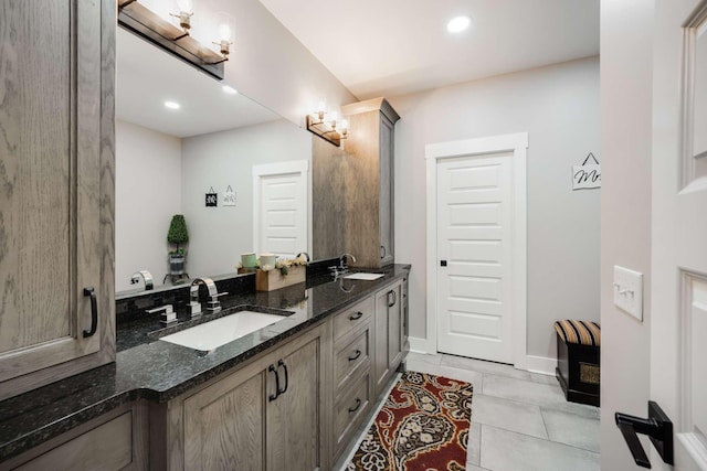 bathroom featuring tile patterned floors and vanity