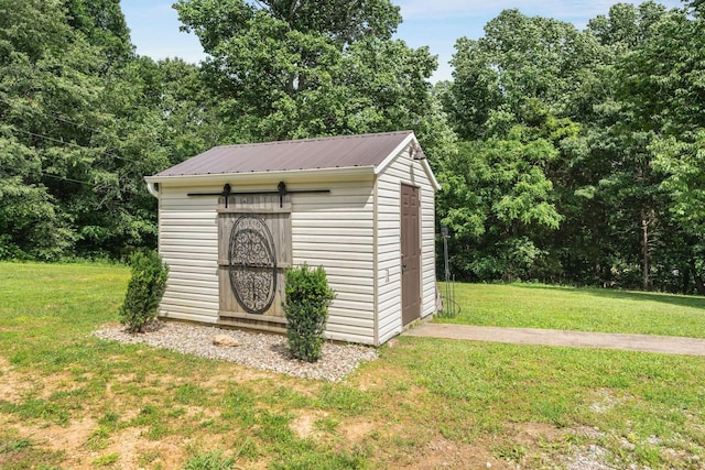 view of outdoor structure with a yard