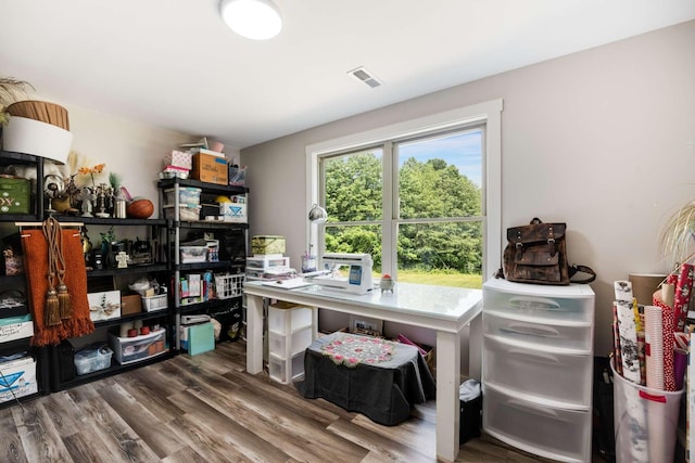 home office with hardwood / wood-style floors