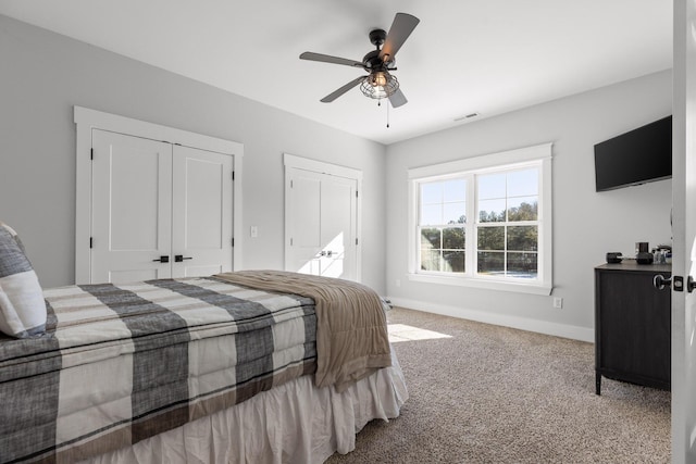 carpeted bedroom featuring ceiling fan