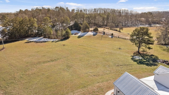 birds eye view of property featuring a rural view