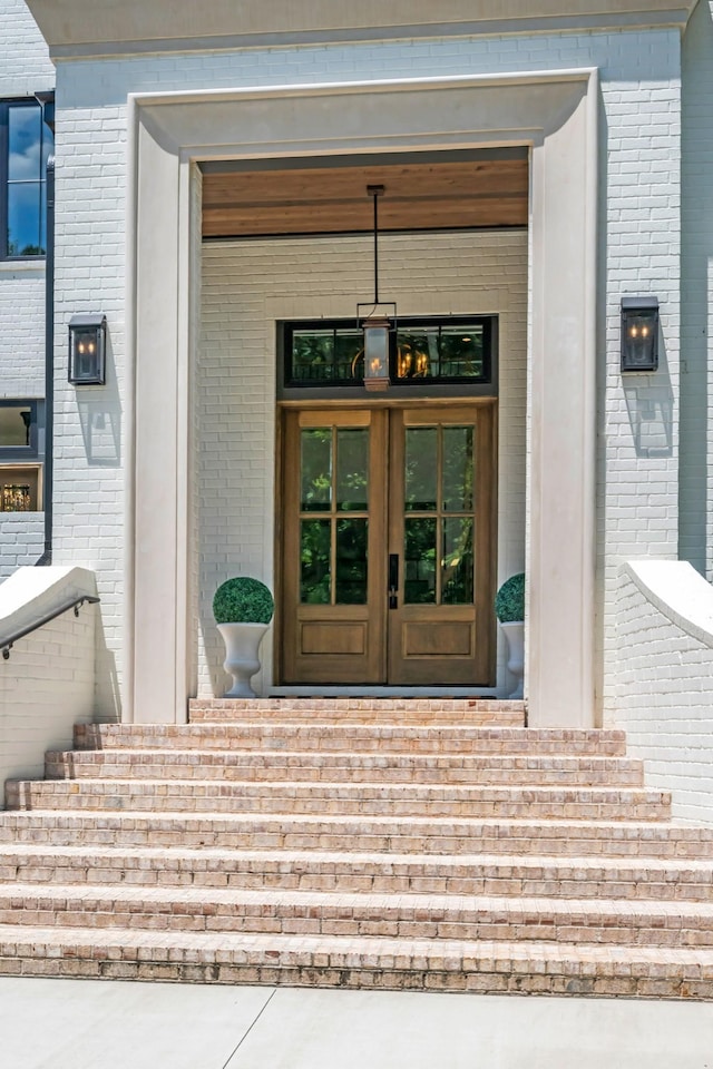 property entrance featuring french doors