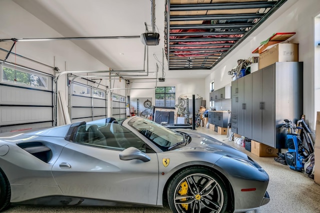 garage featuring a garage door opener