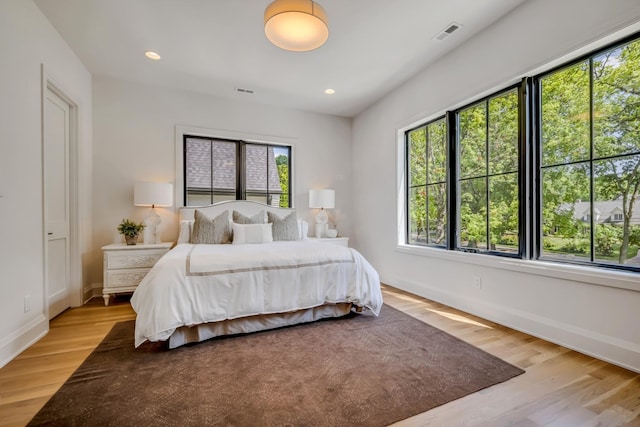 bedroom with light wood-type flooring