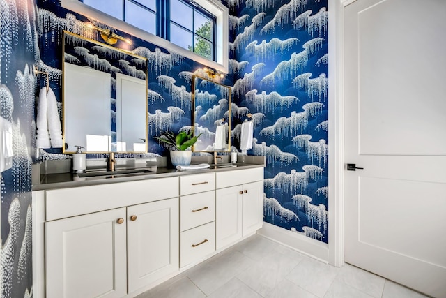 interior space with vanity and tile patterned flooring