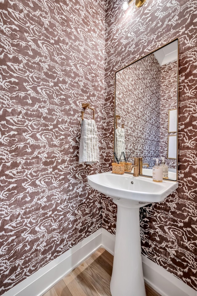 bathroom featuring wood-type flooring