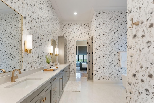 bathroom featuring vanity, a tub, and ornamental molding