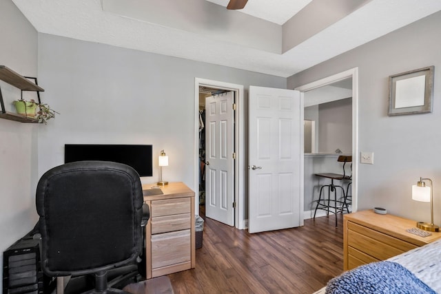 bedroom featuring dark hardwood / wood-style flooring