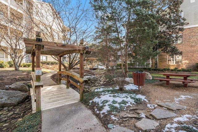 view of property's community with a pergola