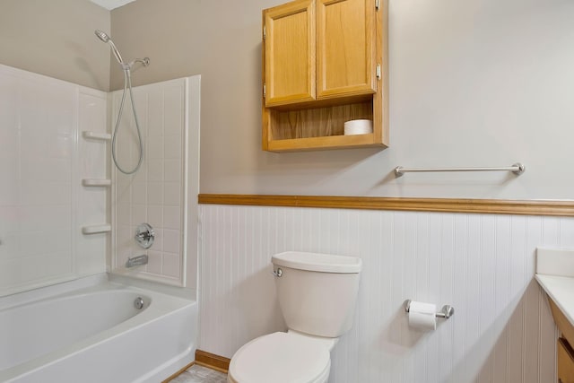 full bathroom with vanity, shower / tub combination, and toilet