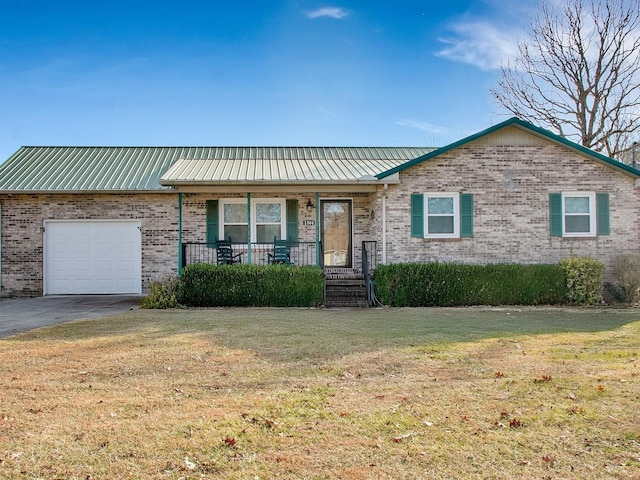 ranch-style home with a porch, a garage, and a front lawn