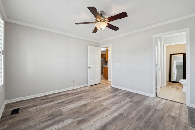 unfurnished bedroom with ceiling fan, light hardwood / wood-style floors, ensuite bathroom, and ornamental molding