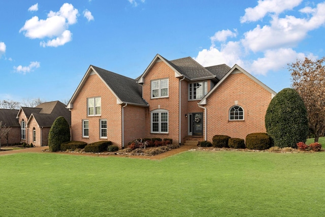 view of property featuring a front yard