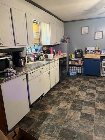 kitchen featuring dishwasher, sink, blue cabinetry, ornamental molding, and white cabinets