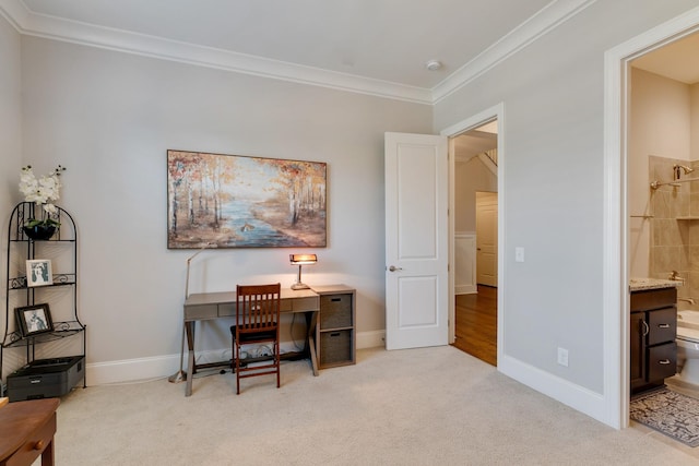 office area with ornamental molding and light carpet