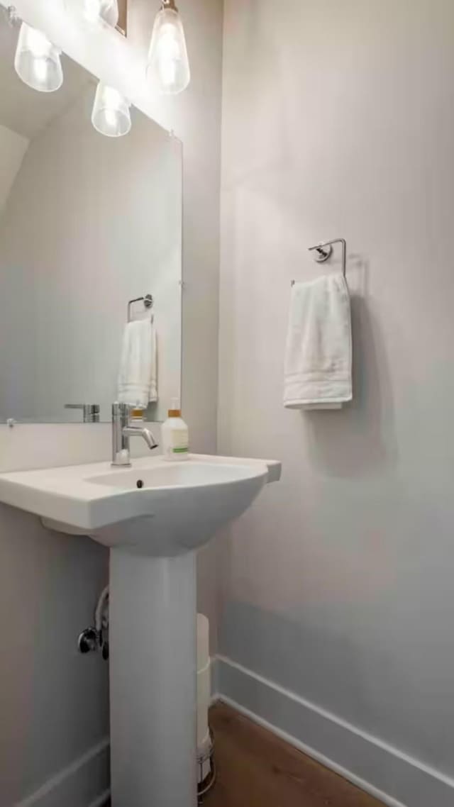 bathroom featuring hardwood / wood-style flooring