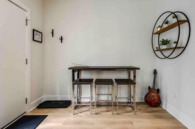 dining space with light wood-type flooring