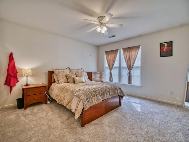 bedroom featuring ceiling fan and light colored carpet