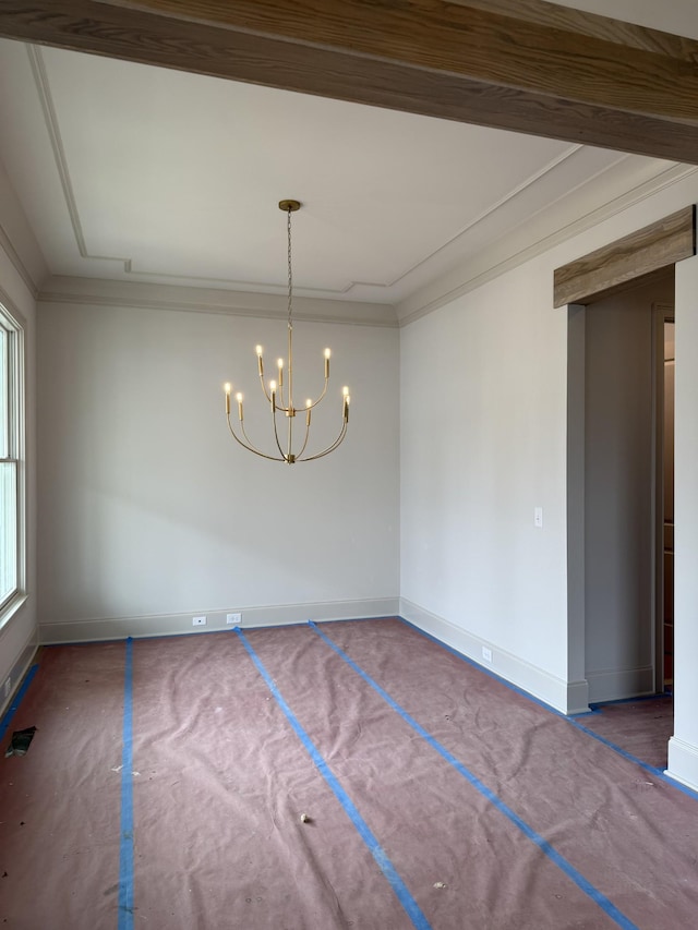 8013 Southvale Blvd, Franklin, TN 37064 - spare room featuring baseboards, a chandelier, and ornamental molding