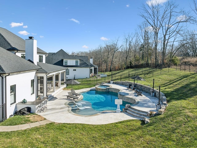 view of pool featuring a patio area, a sunroom, a lawn, an in ground hot tub, and exterior bar