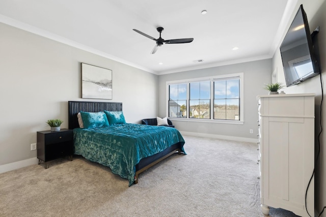 bedroom featuring ceiling fan, ornamental molding, and light carpet