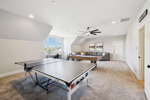 recreation room featuring light carpet, ceiling fan, and lofted ceiling