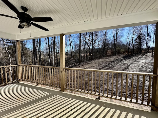 wooden terrace with ceiling fan