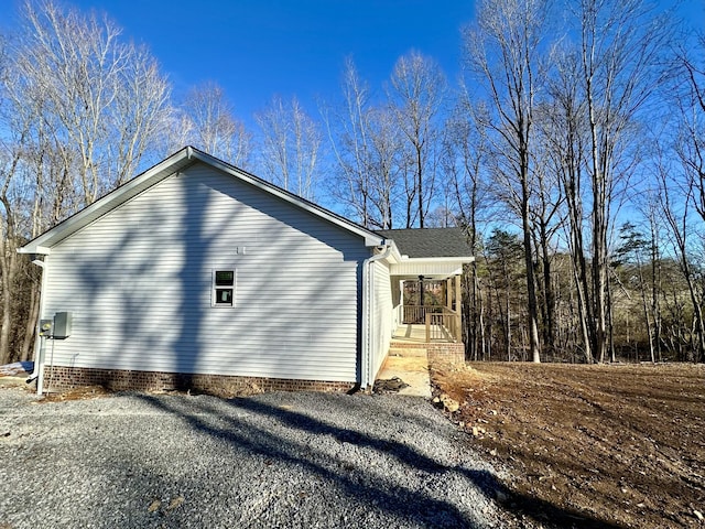 view of home's exterior with covered porch